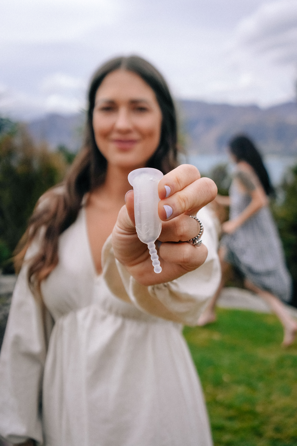 MyCup Menstrual Cup being held